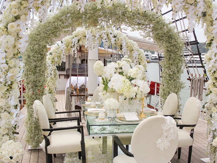 beautiful wedding arrangement in white theme onboard royal albatross