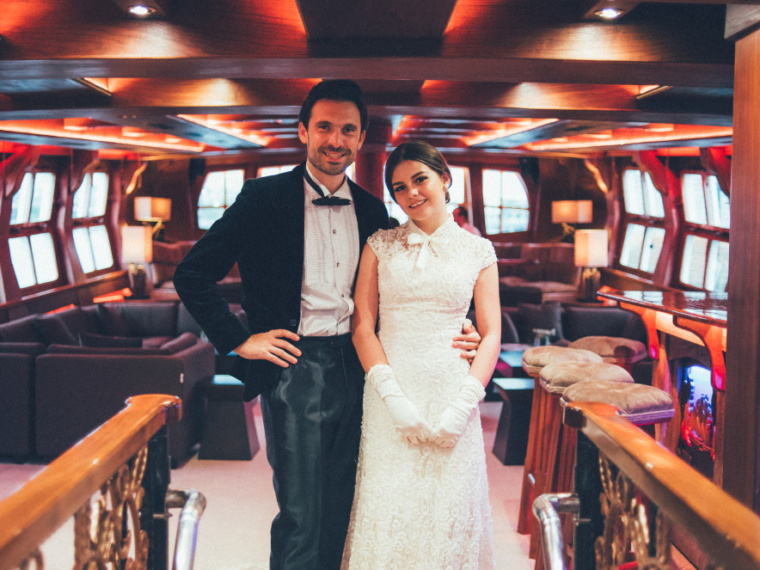 groom and bride in grand salon royal albatross