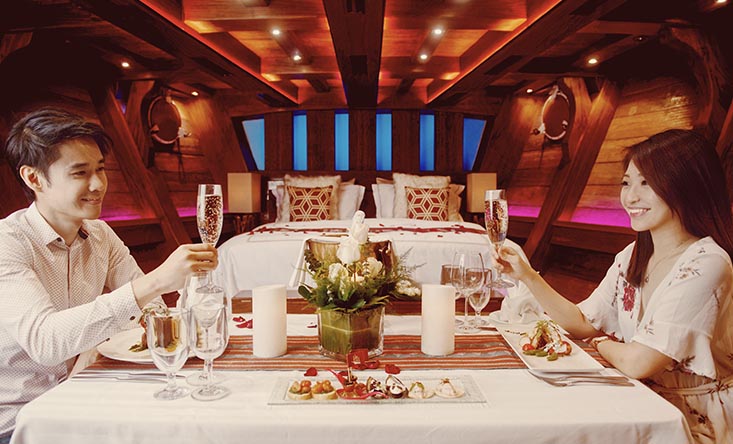 romantic couple anniversary dining in the cabin royal albatross